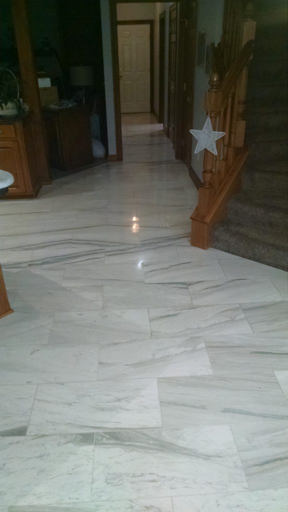 White marble flooring with polished finish
