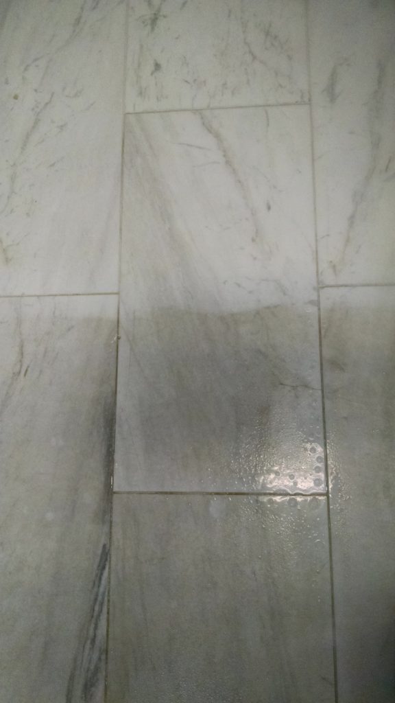 Pre-cleaning of white stone flooring
