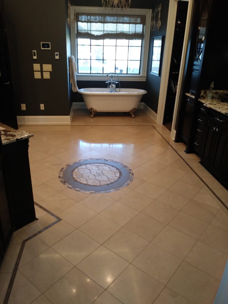 Limestone flooring with original polished finish with wear and soil absorption
