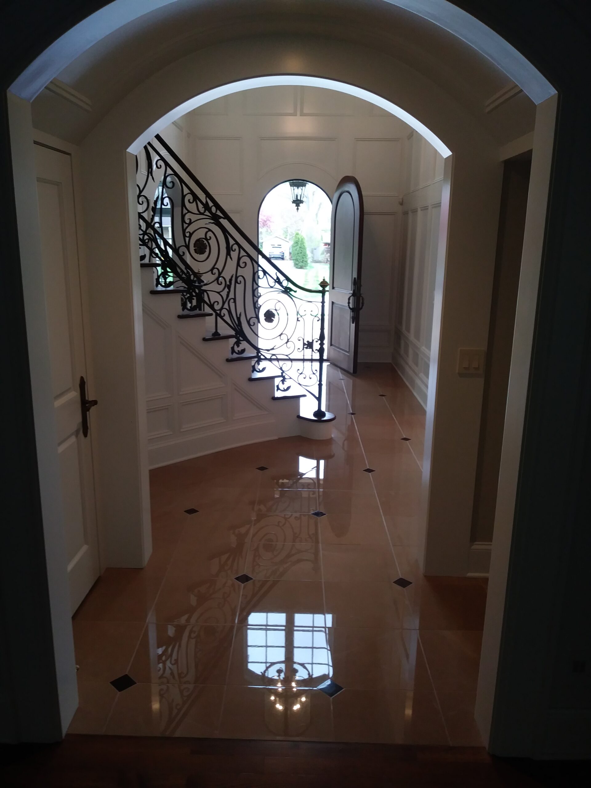Polished marble foyer flooring