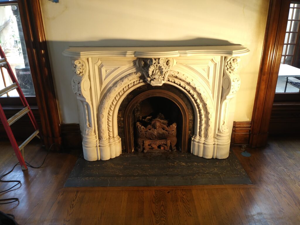 Columbus Club Louis XVI statuary marble fireplace