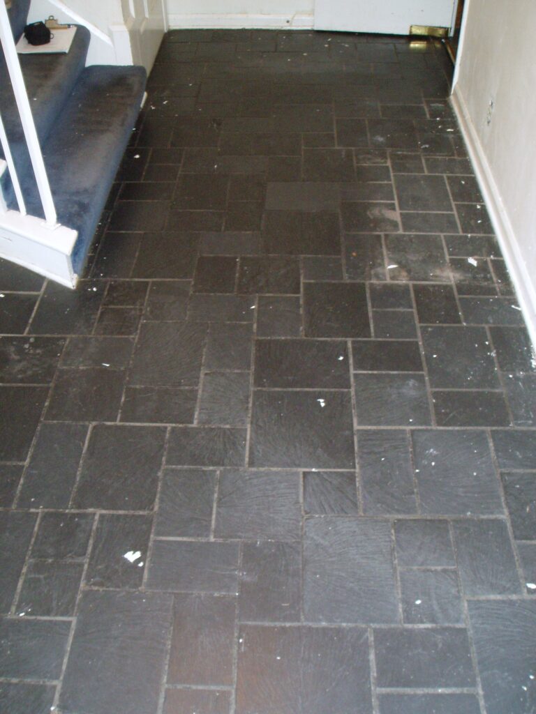 Slate flooring with heavy degraded wax coating