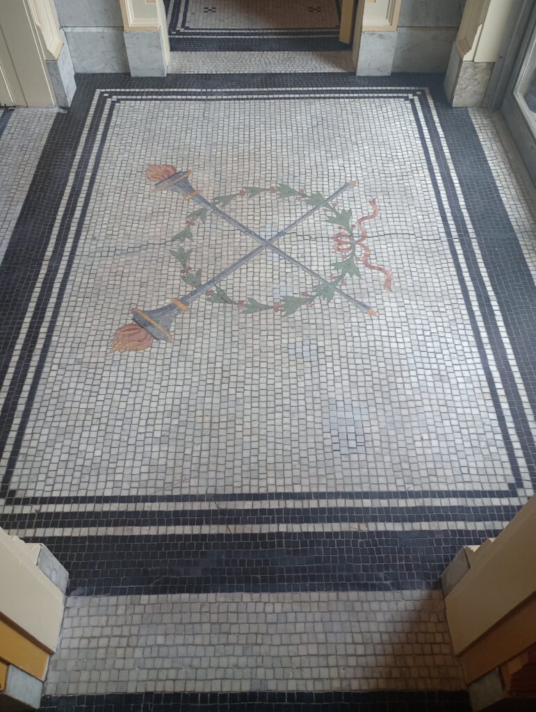 Marble mosaic tile flooring after removal of carpet glue and wax